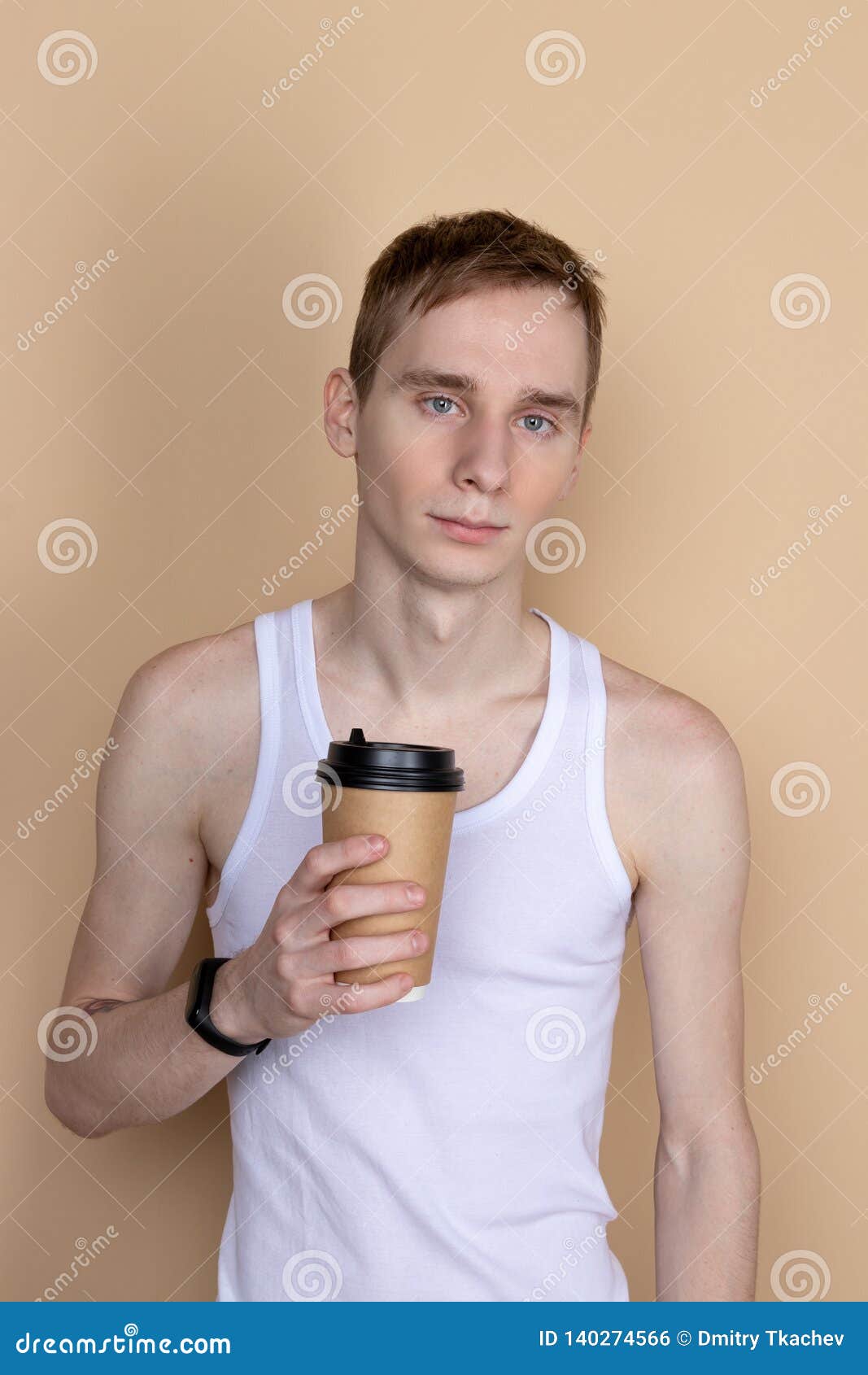 Skinny Handsome Guy Drink from Coffee or Tea Cup. Morning Refreshment