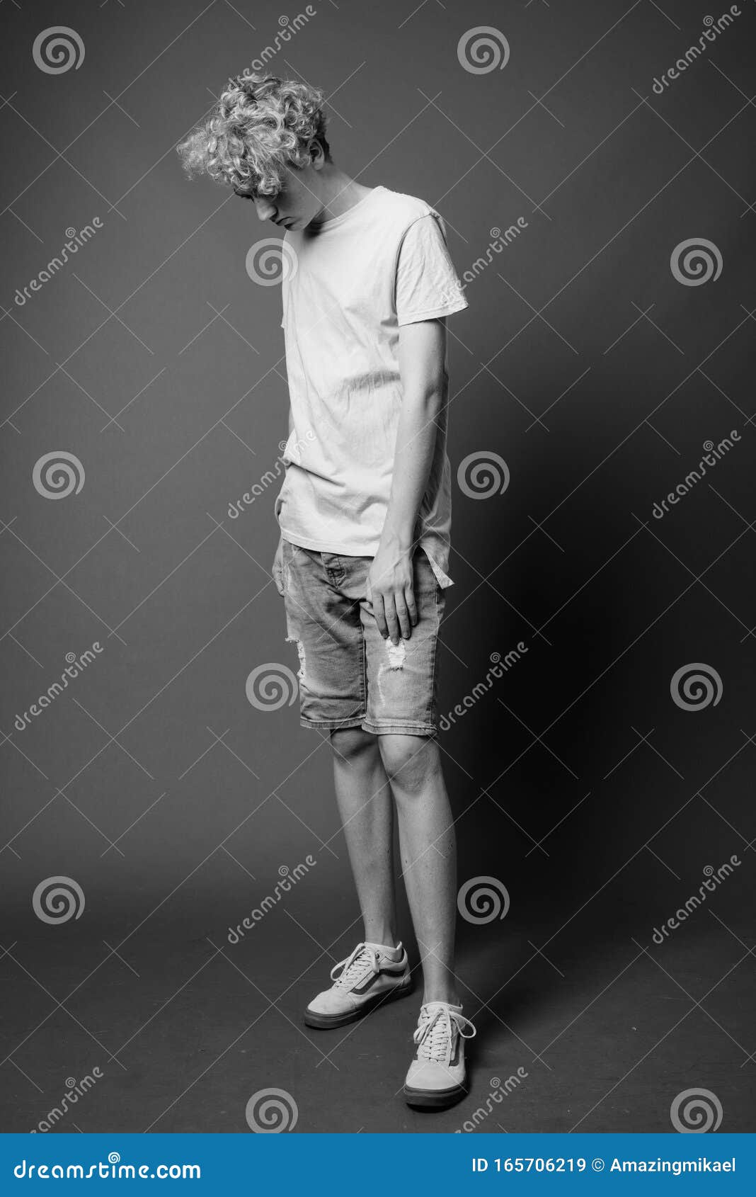 Skinny Young Man with Curly Hair in Black and White Stock Image - Image of black, male: 165706219 Skinny Young Man with Curly Hair in Black and White Stock Image - Image of black, male: 165706219
