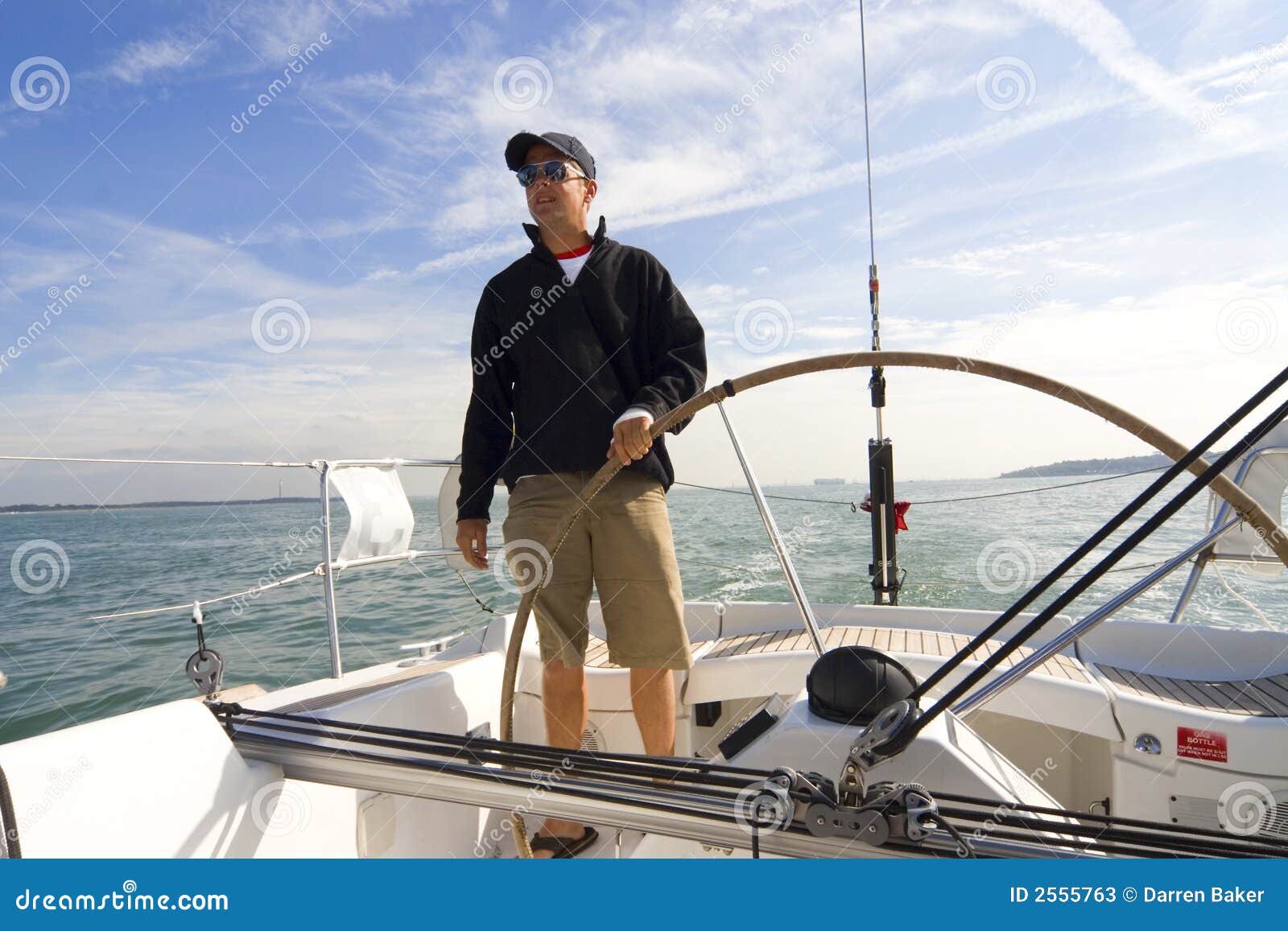 Skipper stock image. Image of blue, sailing, ropes, yachtsman 2555763