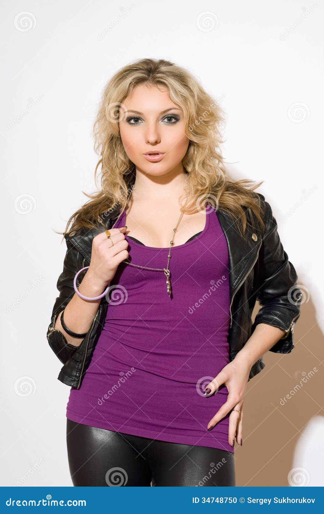 Skittish young blond woman stock photo. Image of model - 34748750