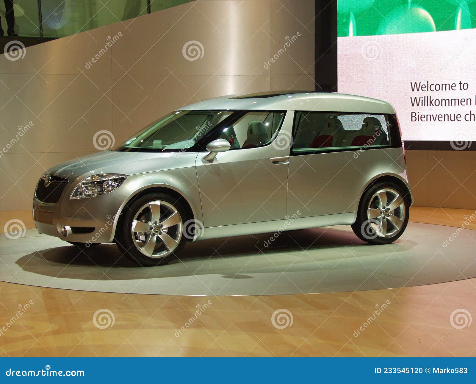 dpa) - Groups of visitors look at the Skoda Roomster at the stand of Skoda  during the IAA international car show in Frankfurt Main, Germany, 9  September 2003. This prototype of a