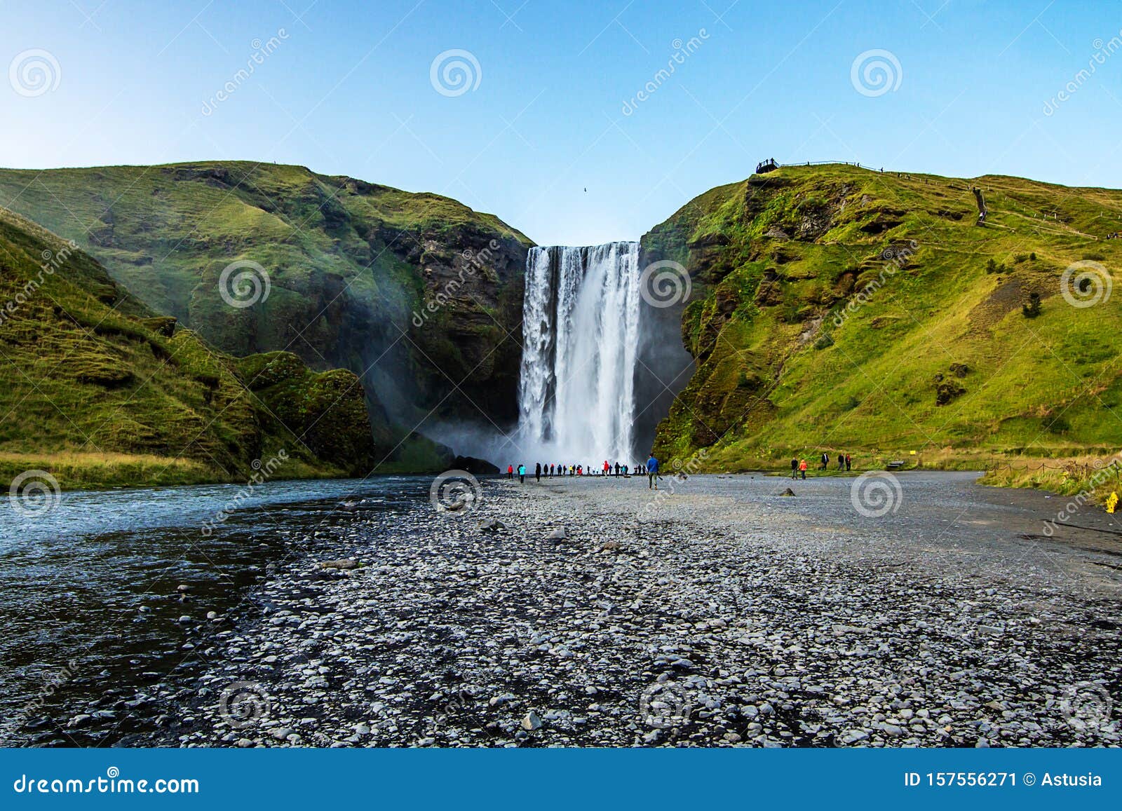 skogafoss the waterfall is located on the cliffs of the former coast. reaches a height of 60 m and a width of up to 25 m