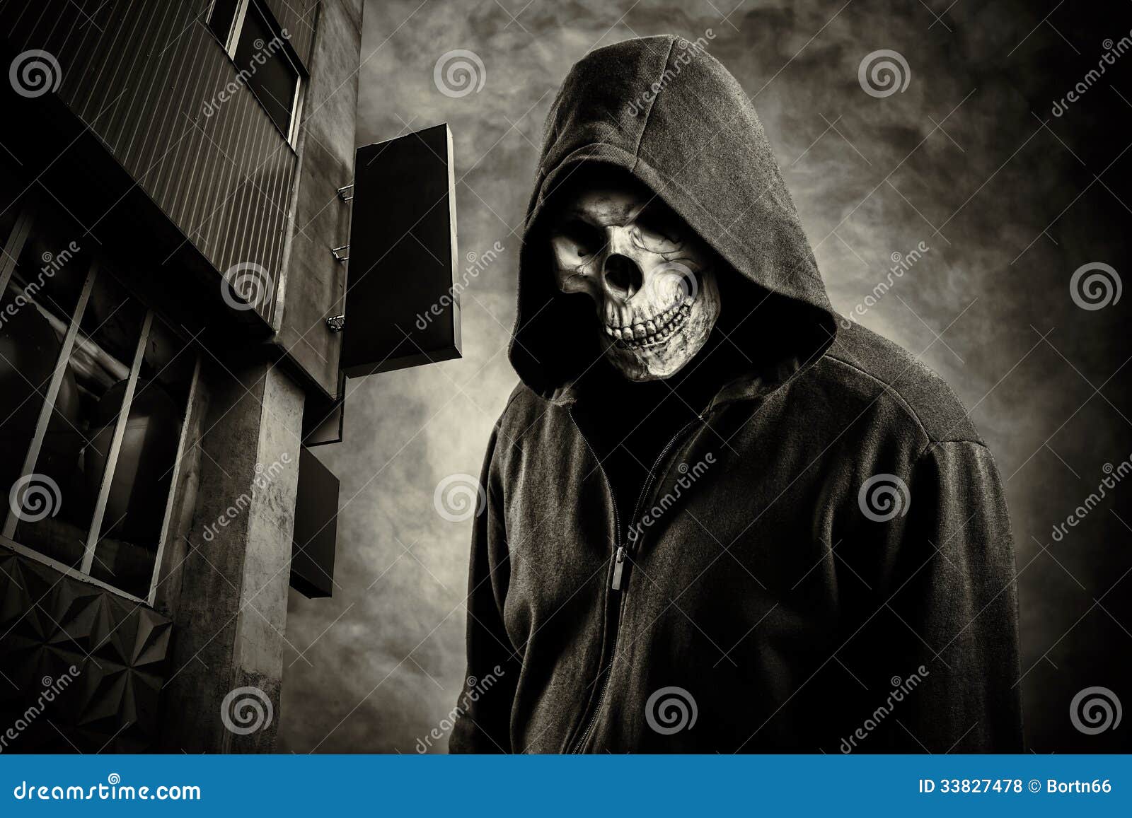 Skull in the hood stock photo. Image of monster, satana - 33827478