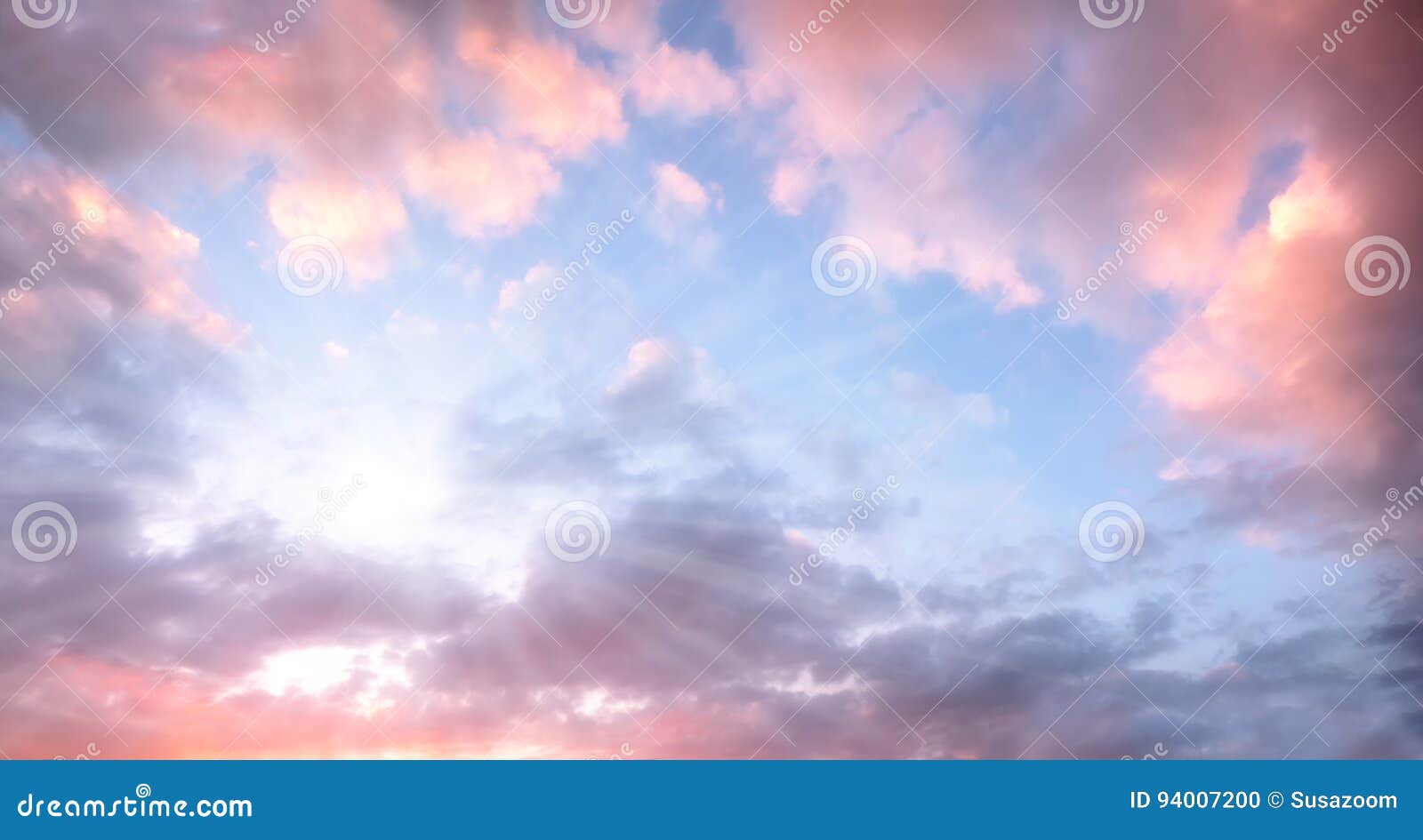 Sky with Beautiful Pink Clouds and Bright Sunshine Stock Photo Image