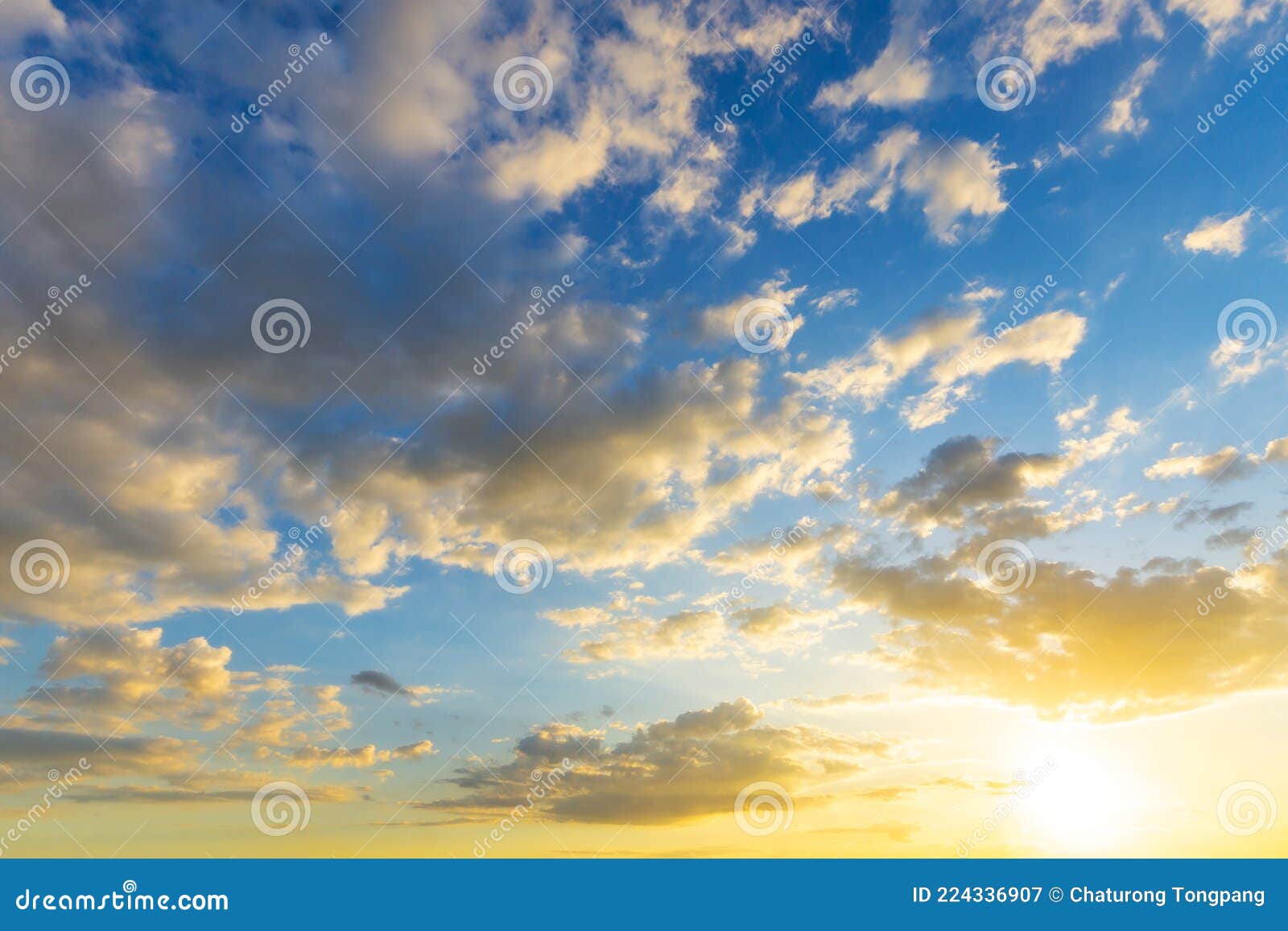 Sky Orange Light of the Sun through the Clouds in the Sky Stock Image