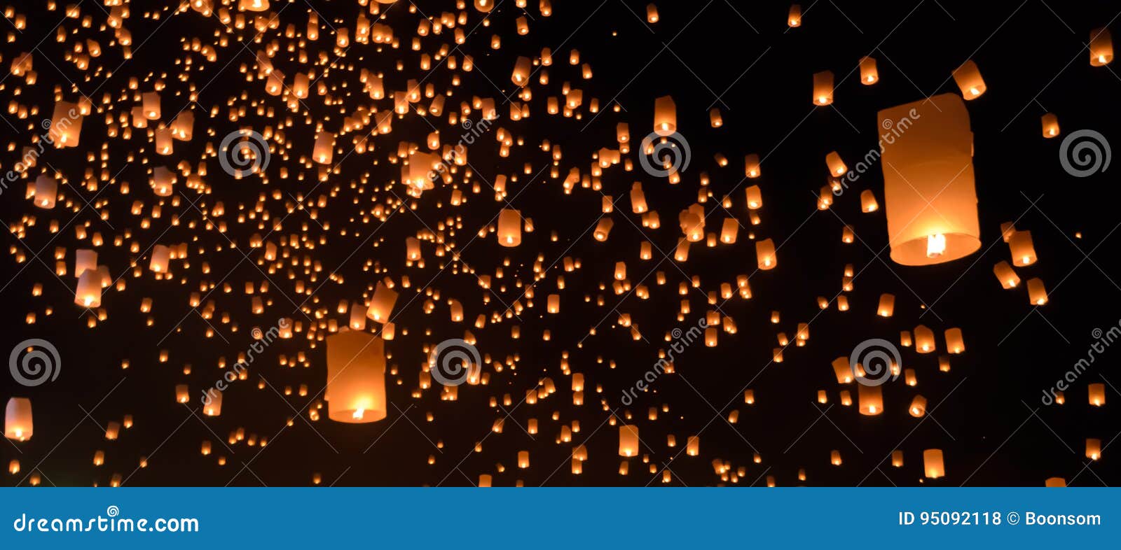 sky lanterns on black sky