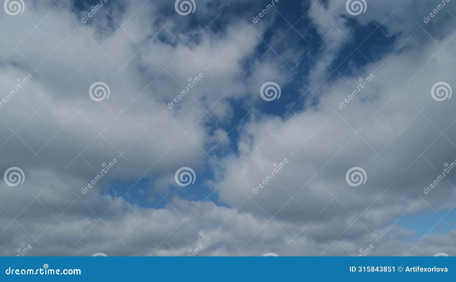 sky after the storm. majestic amazing blue sky with stratocumulus clouds. timelapse.