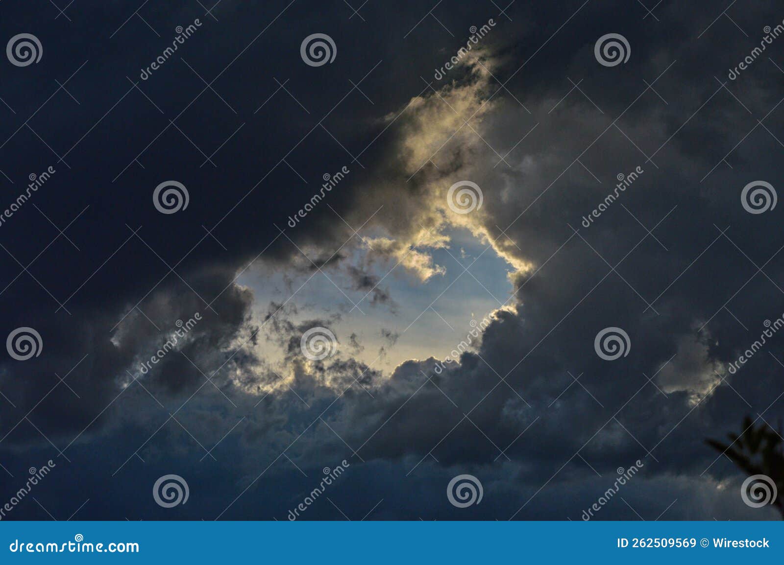 Sky Visible through the Hole Formed in Clouds Stock Image Image of