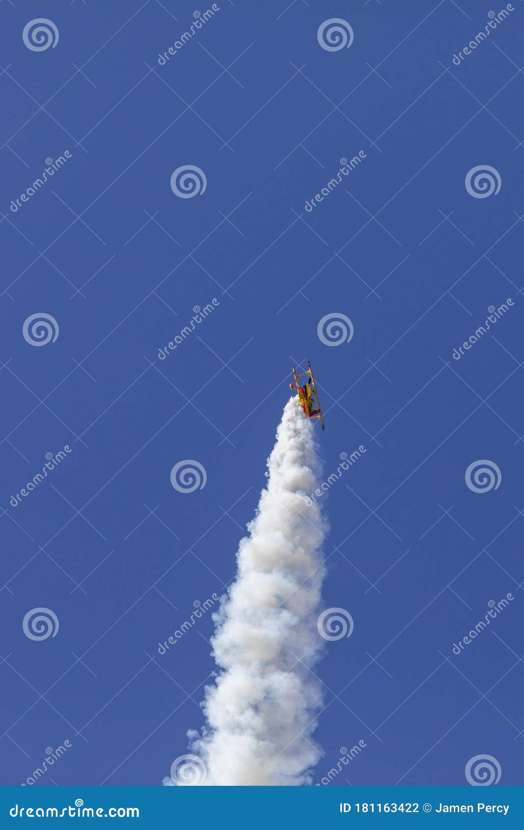 skyaces plane performing aerobatics with a smoke trail
