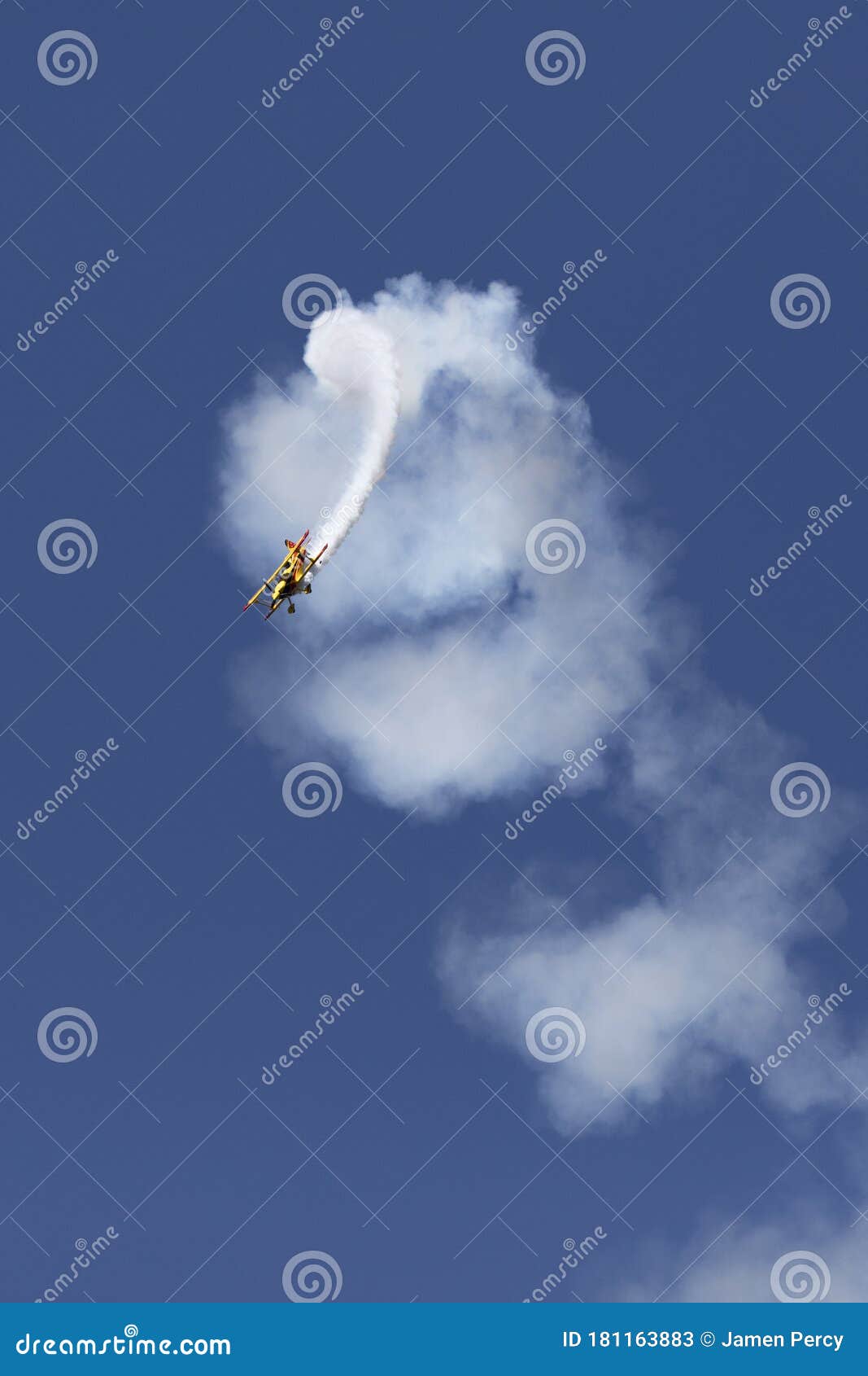 skyaces plane performing aerobatics with a smoke trail