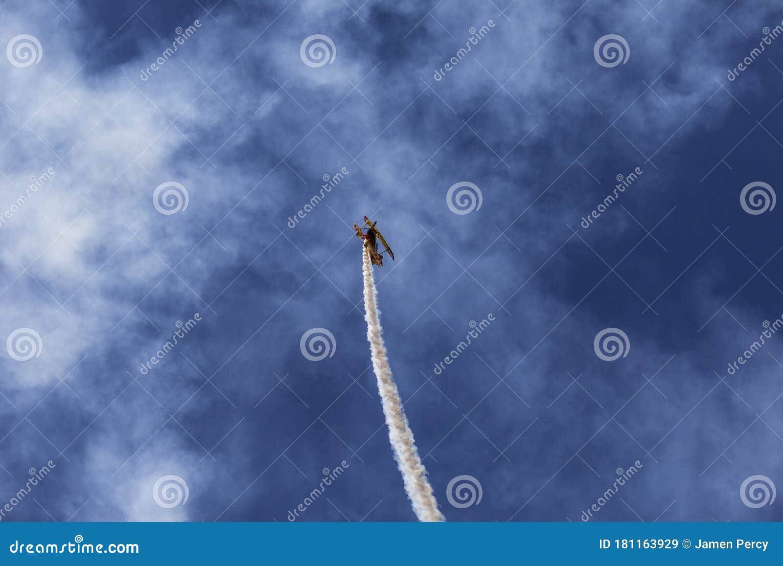 skyaces plane performing aerobatics with a smoke trail