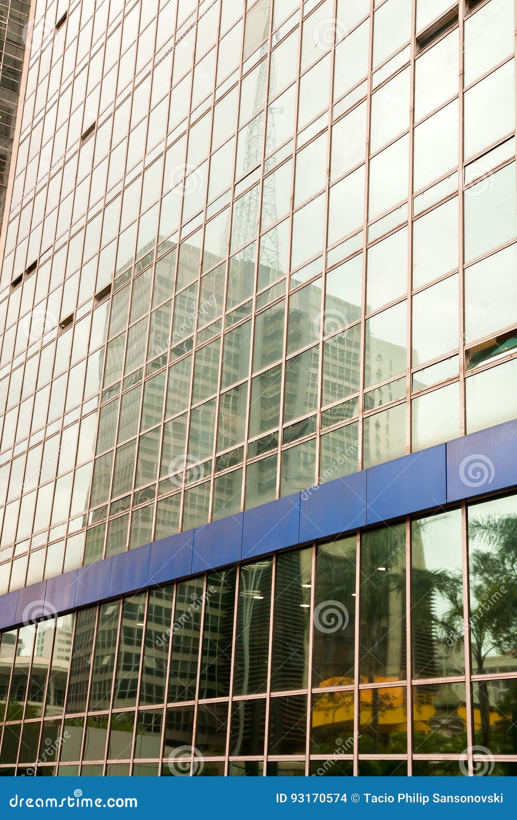 skycraper reflextion on a modern glass building