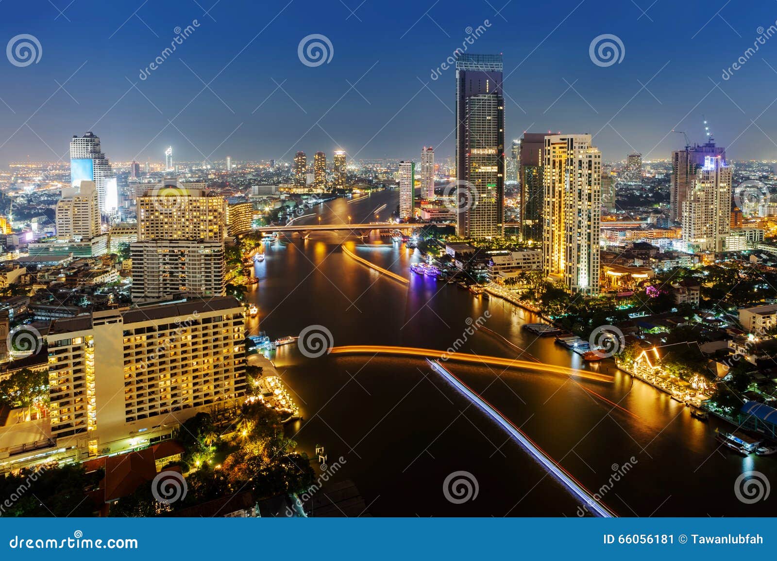 skycrapper view of bangkok city with rive at night time.