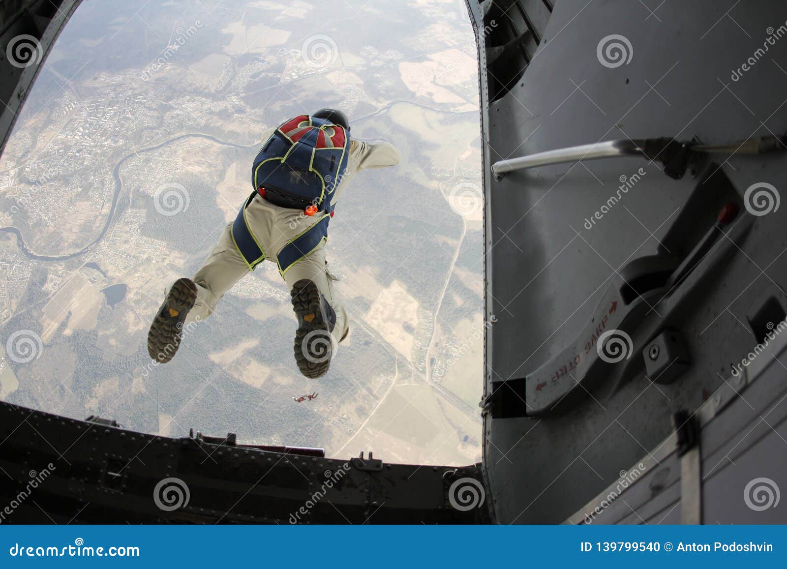 skydiving. skydiver has just jumped out of a plane.