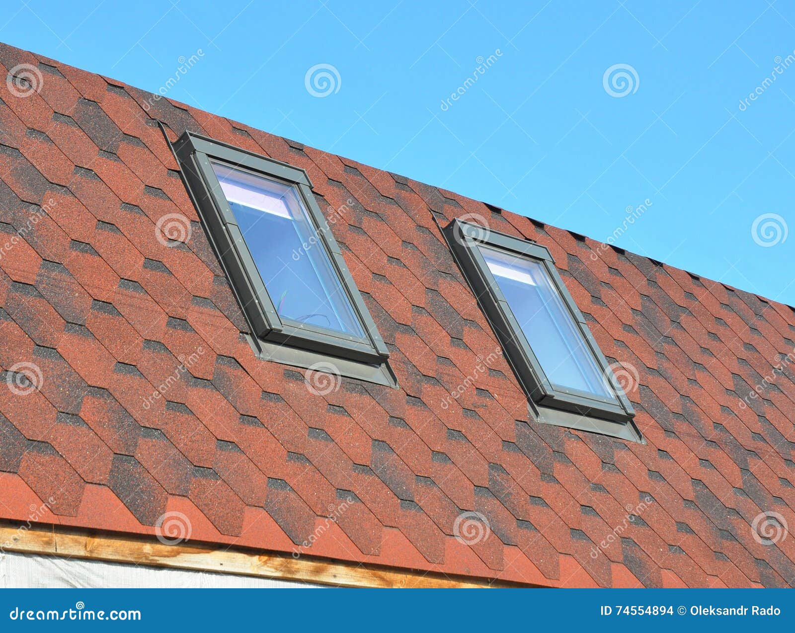 skylights installation. roofing construction with new installed attic skylights or roof