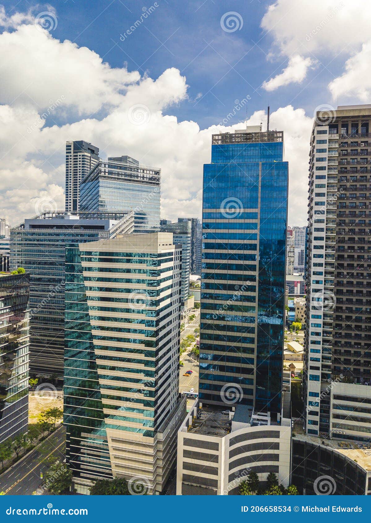 the skyline of bonifacio global city in metro manila. modern contemporary office highrises.