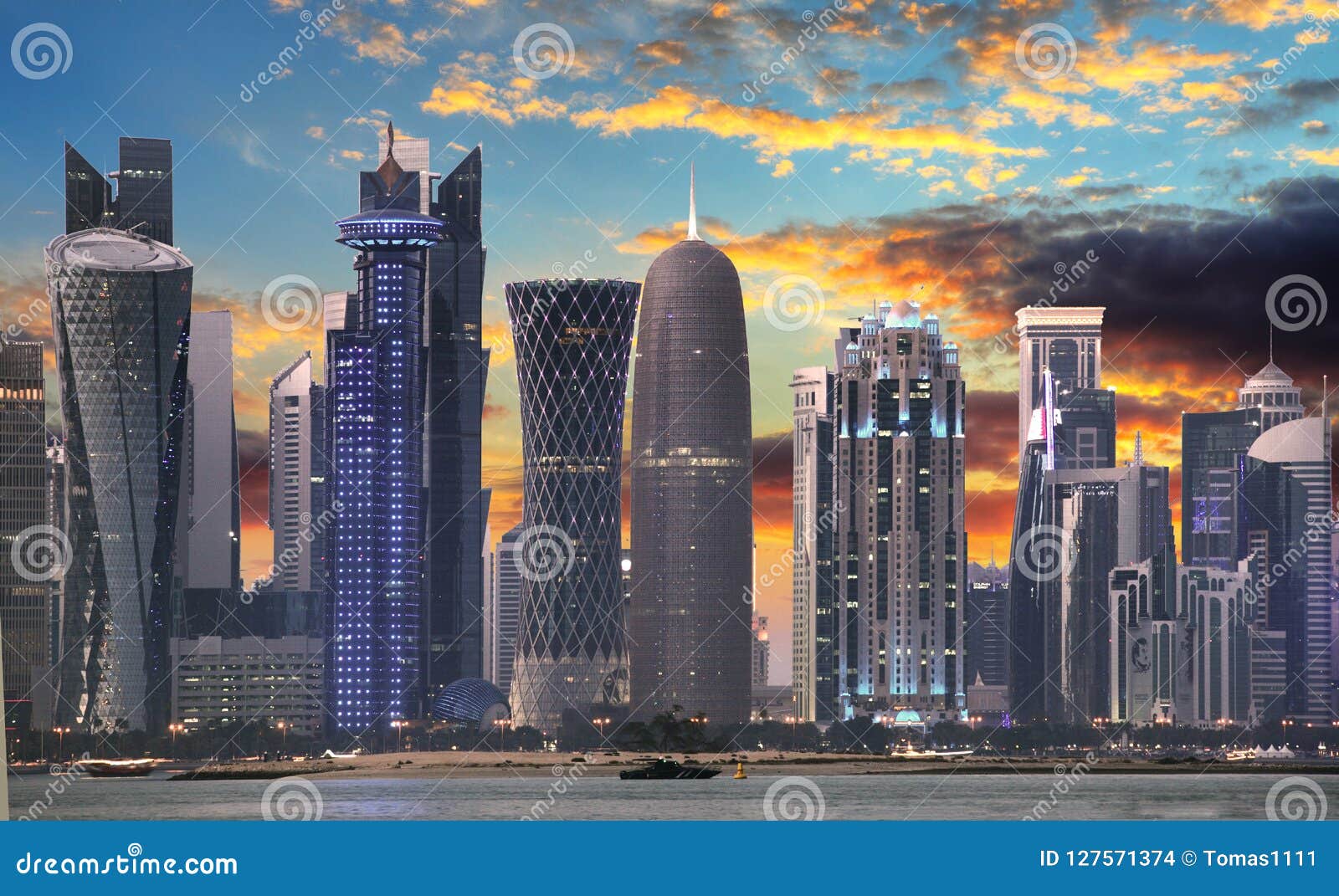 the skyline of doha, qatar before sunset