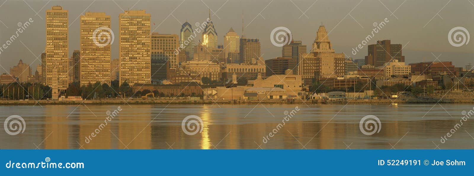 This is the skyline view from Camden, New Jersey. It shows sunrise on the river.