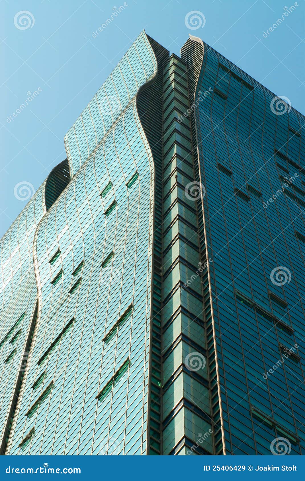 Skyscraper on blue sky stock image. Image of architecture - 25406429 : The incredible picture capturing a beautiful scenery. The tones are vibrant and combination perfectly. Its layout looks fantastic, with the particulars are extremely clear.