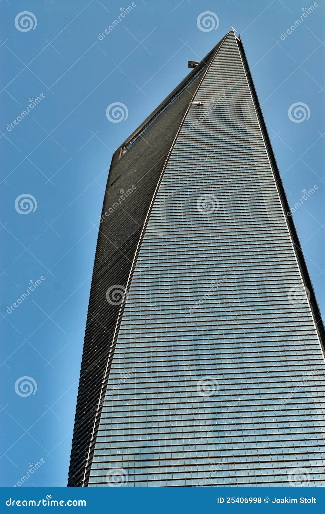Skyscraper on blue sky stock photo. Image of color, beautiful - 25406998 : An amazing image showing a stunning scenery. The hues are just bold and blend perfectly. The composition looks fantastic, with the details are also highly defined.