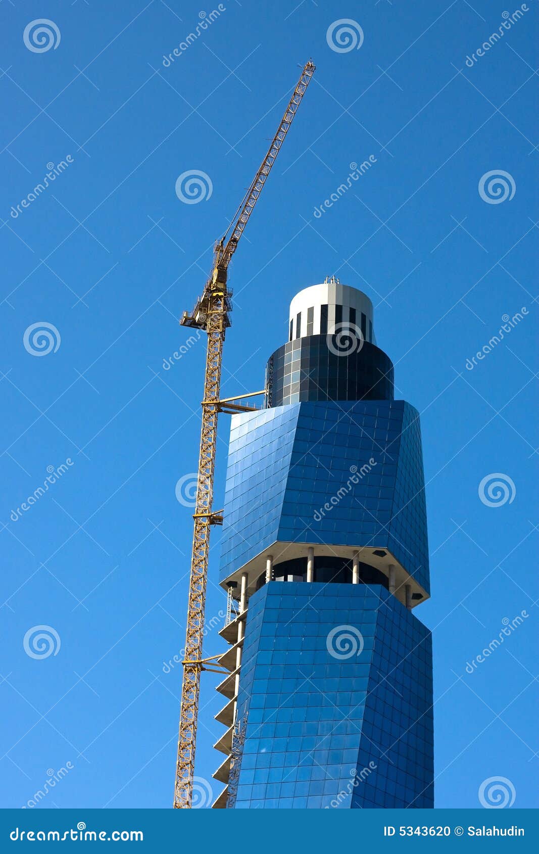 Skyscraper in sarajevo. A high modern building in glass in construction under the blue sky