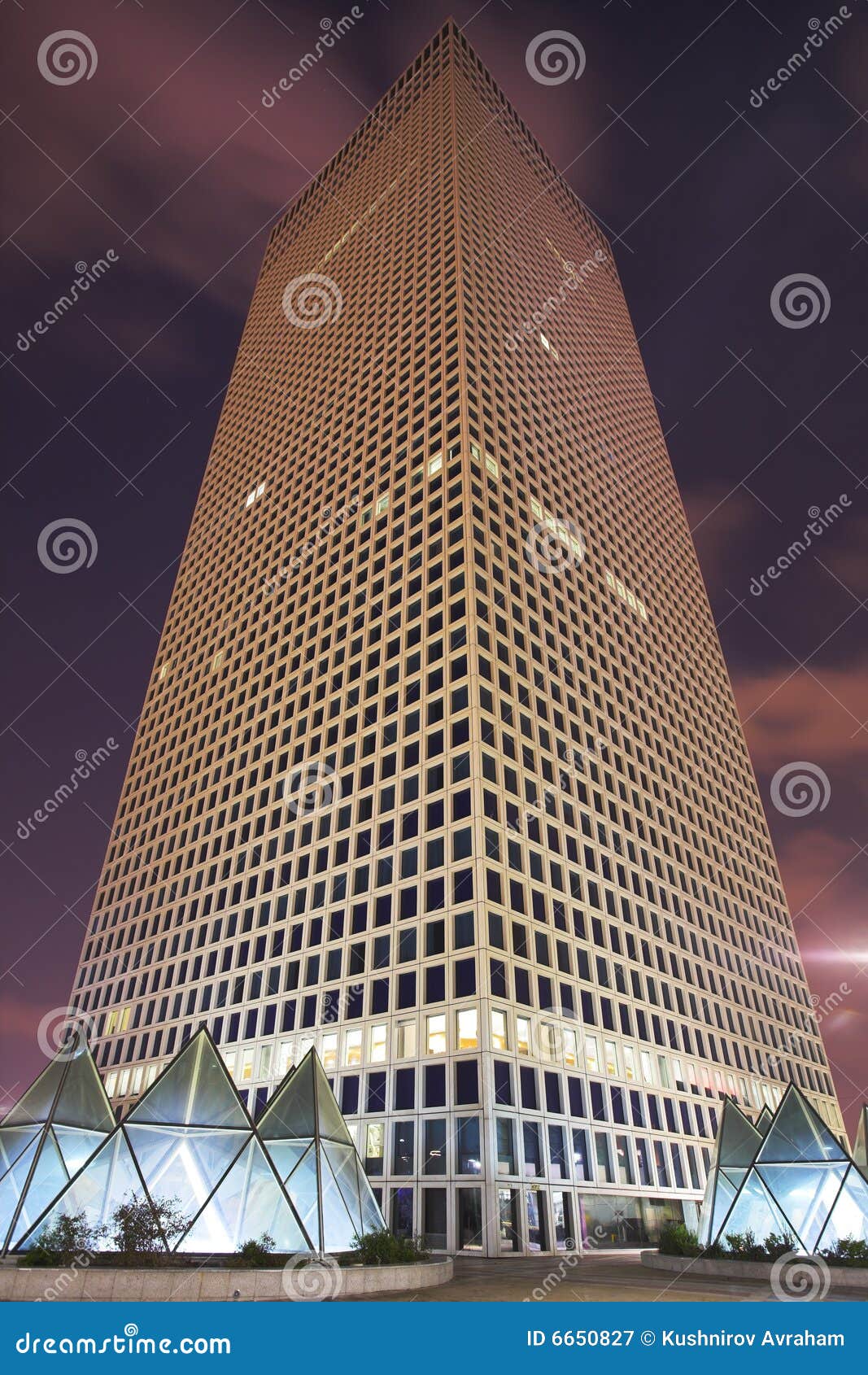 Skyscraper of the Unusual Triangular Form Stock Image - Image of light