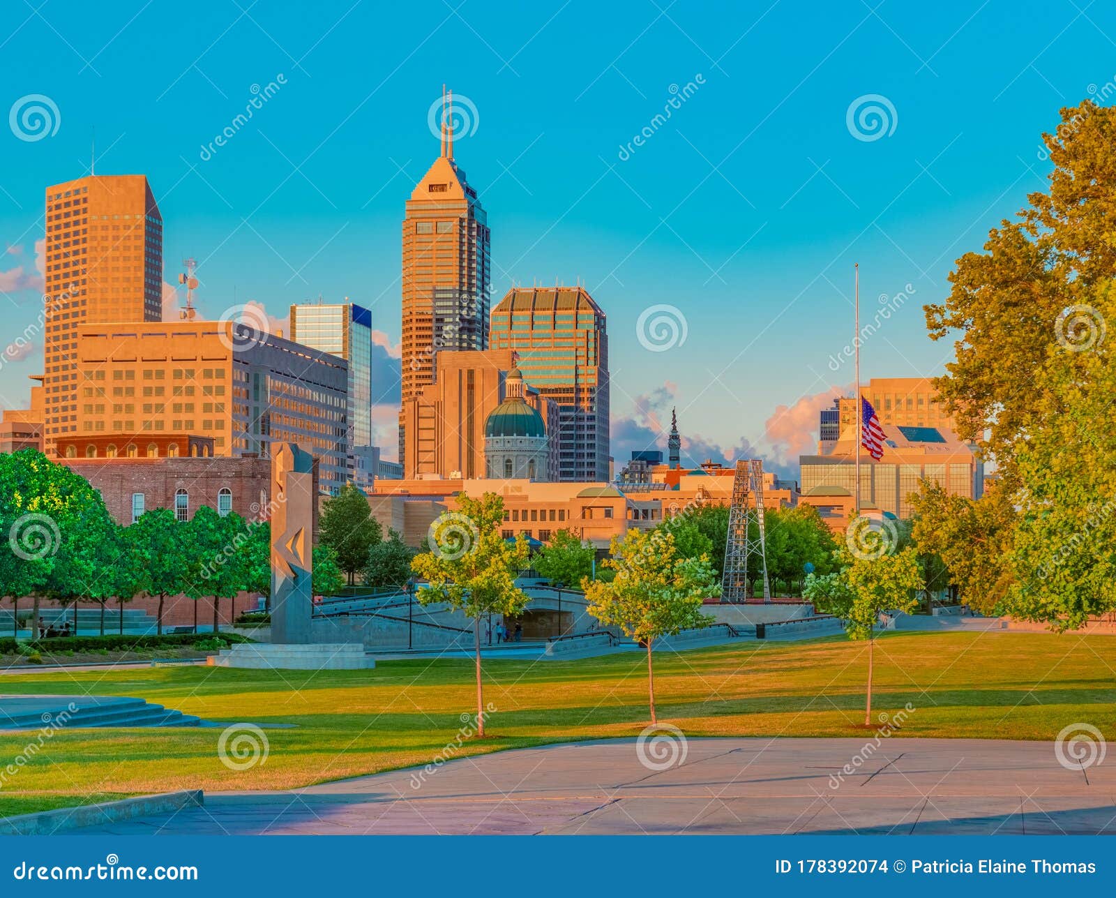 dusk lights hits the indianapolis skyline in the white river state park, indiana