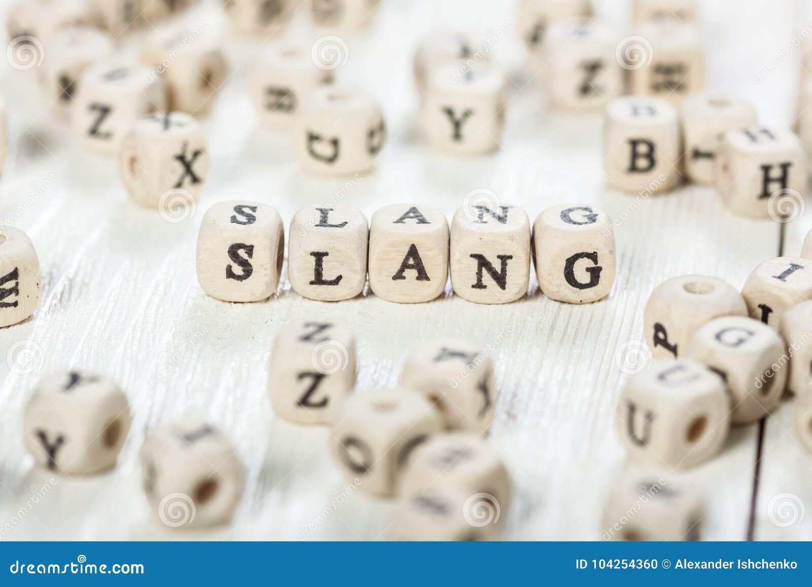 slang word written on wood block.
