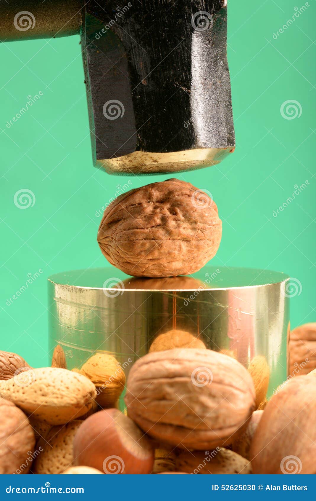 Sledgehammer To Crack a Nut 1 Stock Photo Image of overreact, react