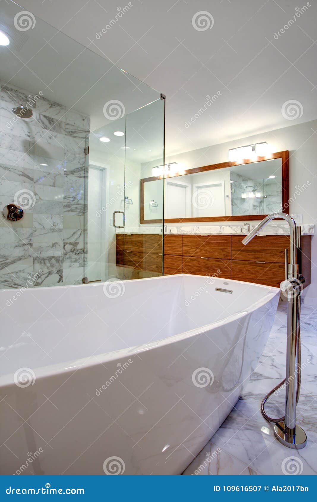 sleek bathroom with freestanding bathtub and walk in shower