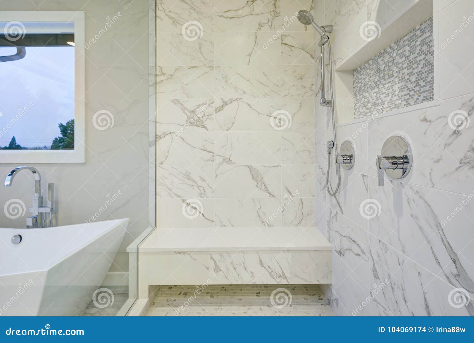sleek bathroom features marble walk-in shower