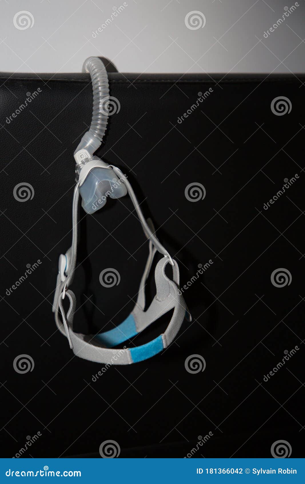 Sleeping Apnea CPAP Mask Machine in Bed Room in Home Patient Stock