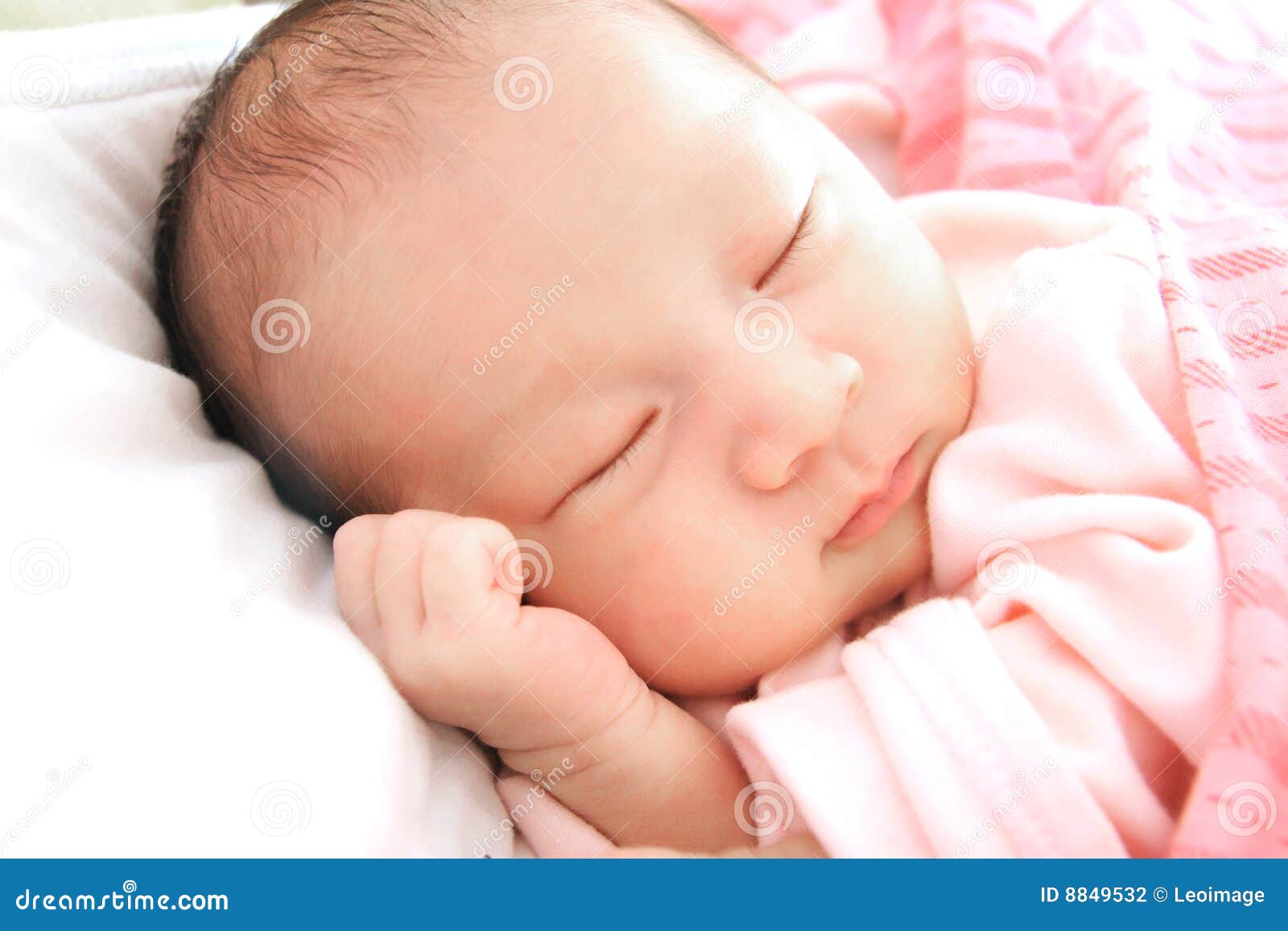 Closeup of sleeping baby lying in a comfortable position