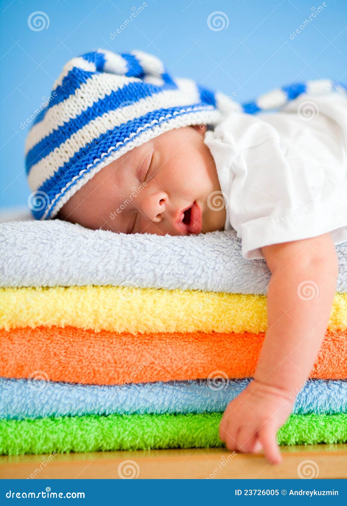 Sleeping Baby on Colorful Towels Stack Stock Image Image of child