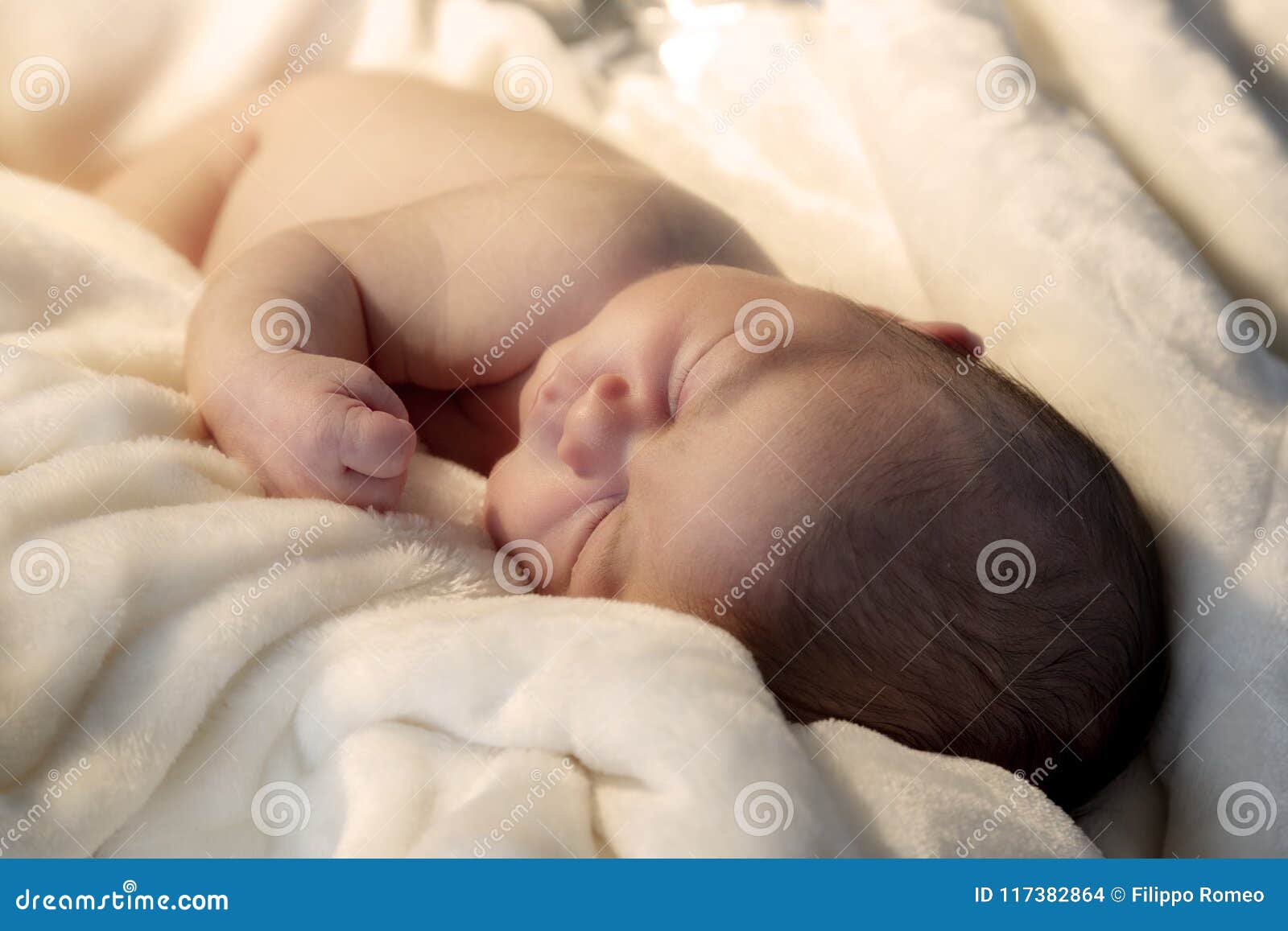 sleeping baby on cuddly blanket