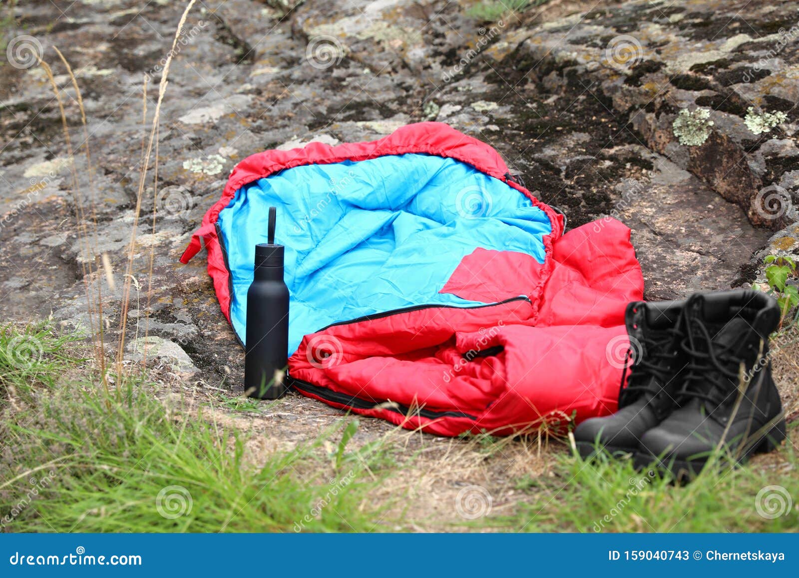 Sleeping Bag, Boots and Bottle. Camping Gear Stock Image Image of