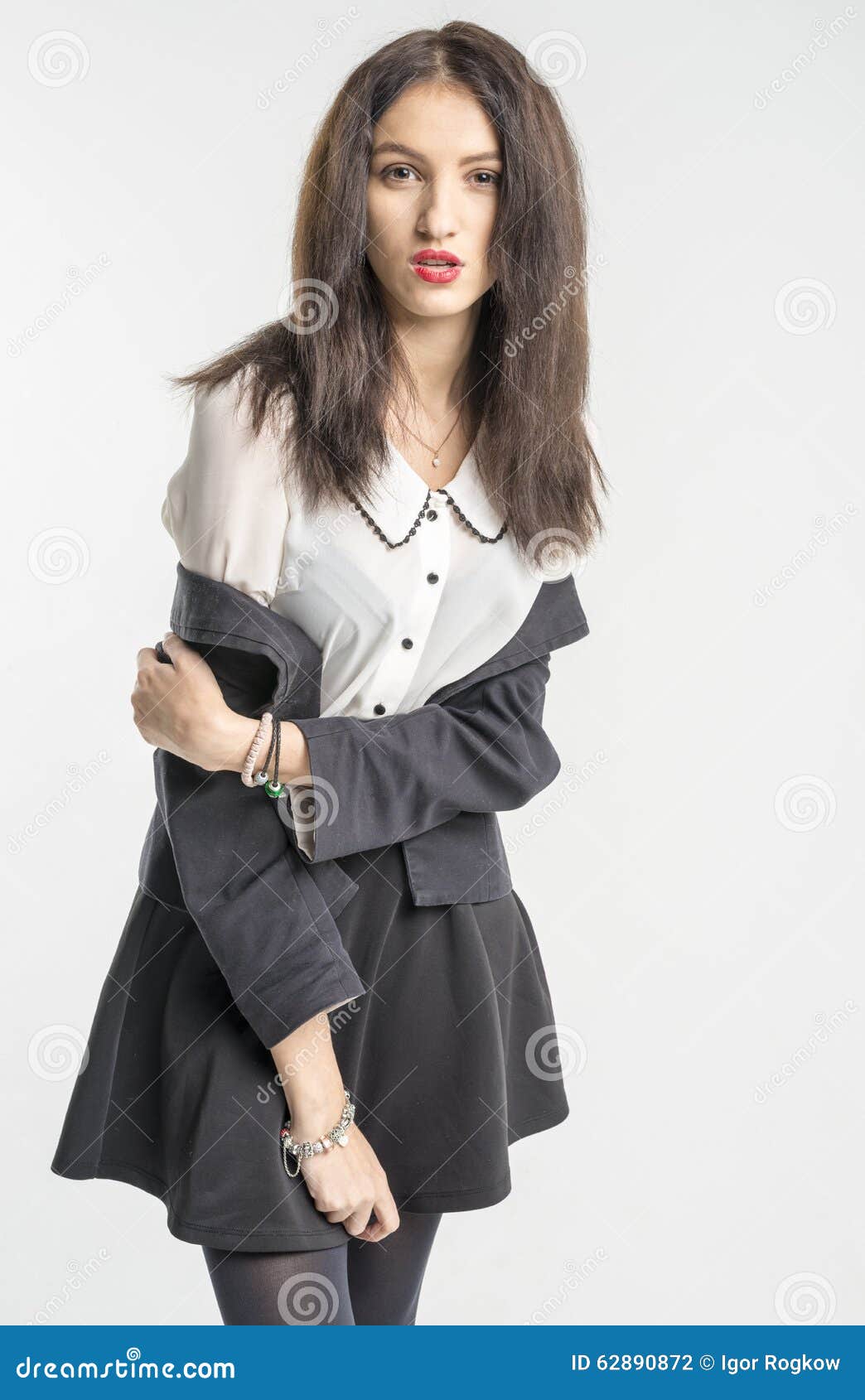 Slender Brunette Girl Removes a Business Suit Undressing Stock Photo ...