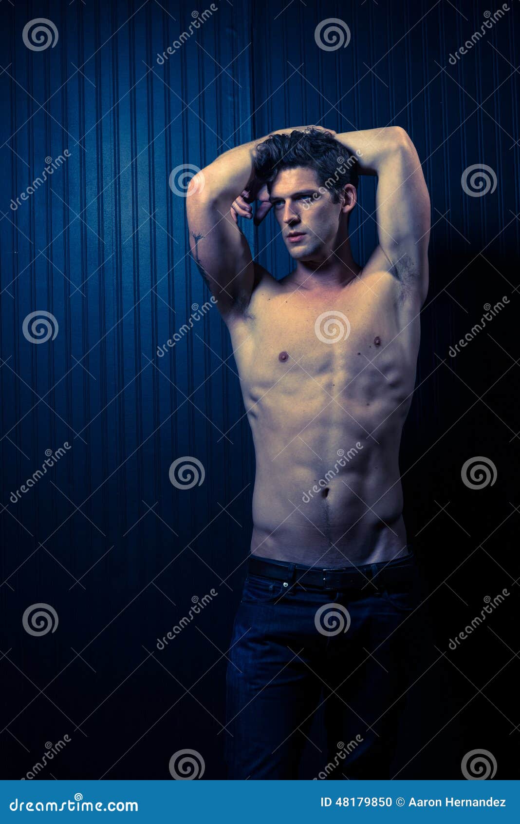 Slender Male Washboard Abs stock photo. Image of blue 48179850