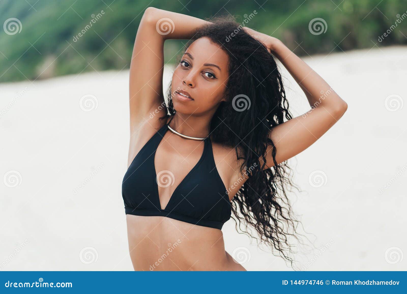 Slender Dark Skinned Girl in Swimwear Posing on Beach with Sand. Afro  American Woman Resting on Paradise Island Stock Photo - Image of vacation,  swimsuit: 144974746