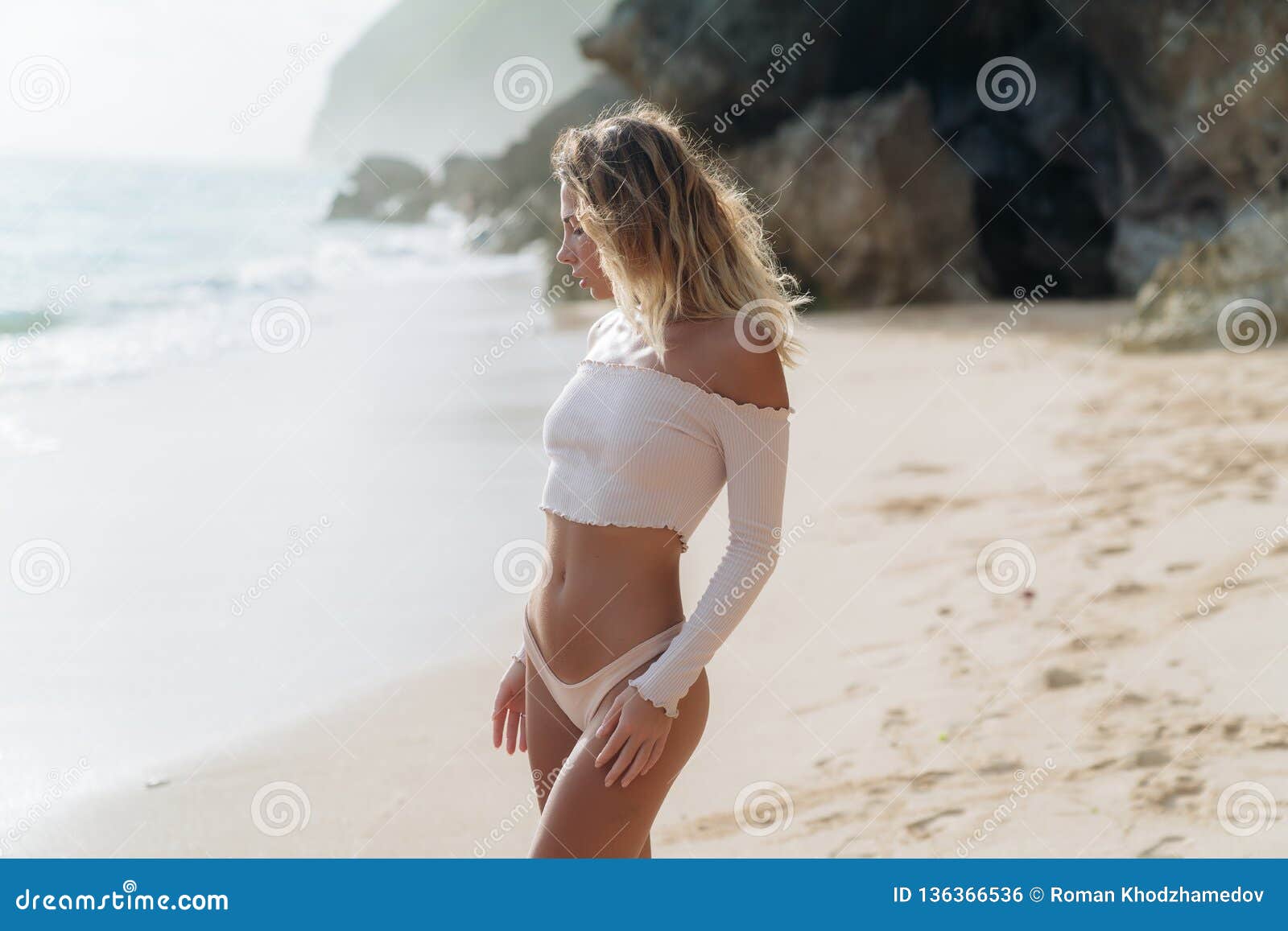 Nude babes are having some good time on the beach