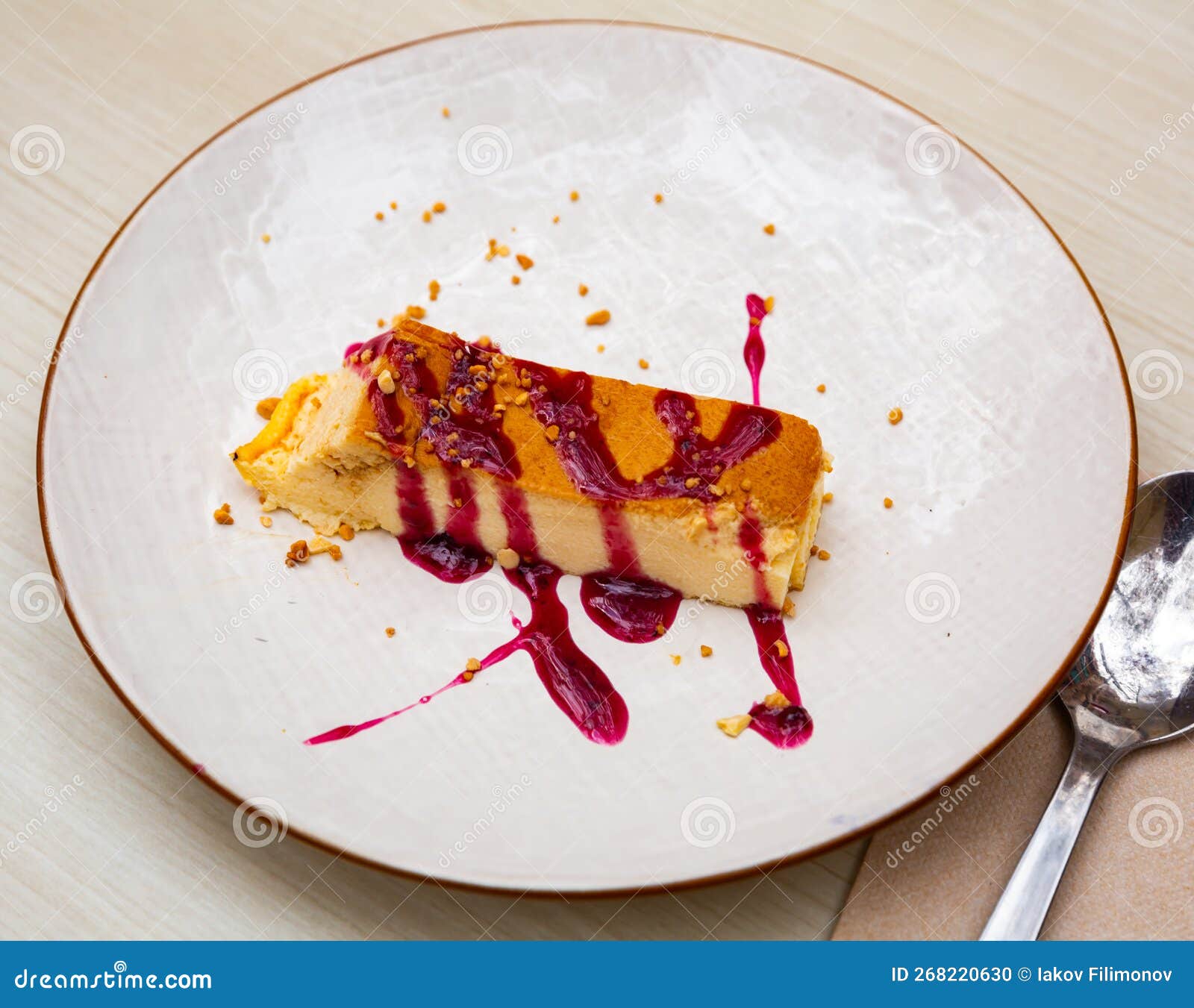 slice of delicious cake with cheese mousse with blueberry topping on plate. spanish dessert tarta de queso con arandano