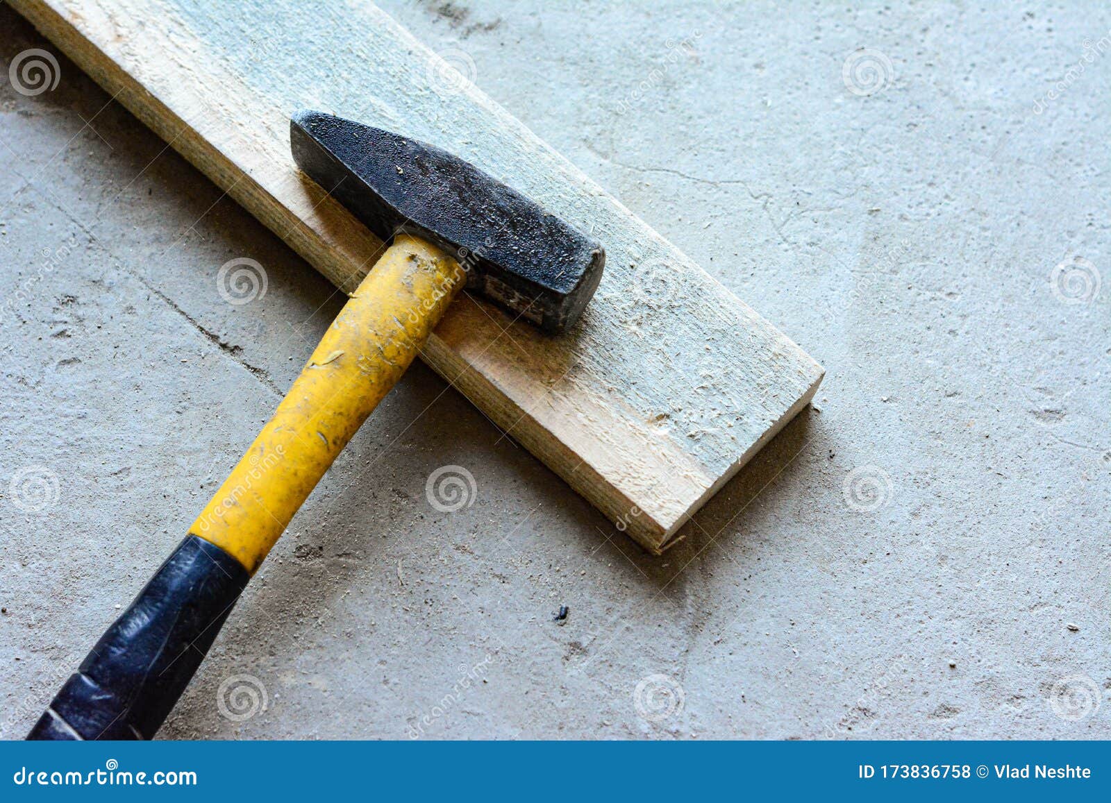 A Slice Lies on a Boardwalk. Concrete Floor Hammer Stock Photo Image