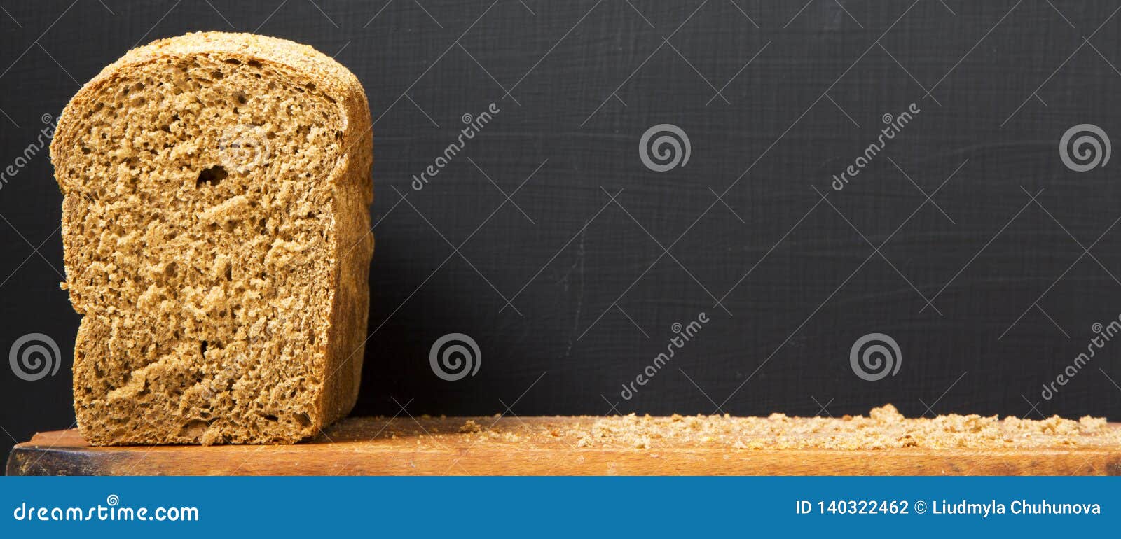 Sliced Bread On Wooden Board Black Background Side View Copy Space Sliced Bread On Wooden Board Black Background Side View Copy Space