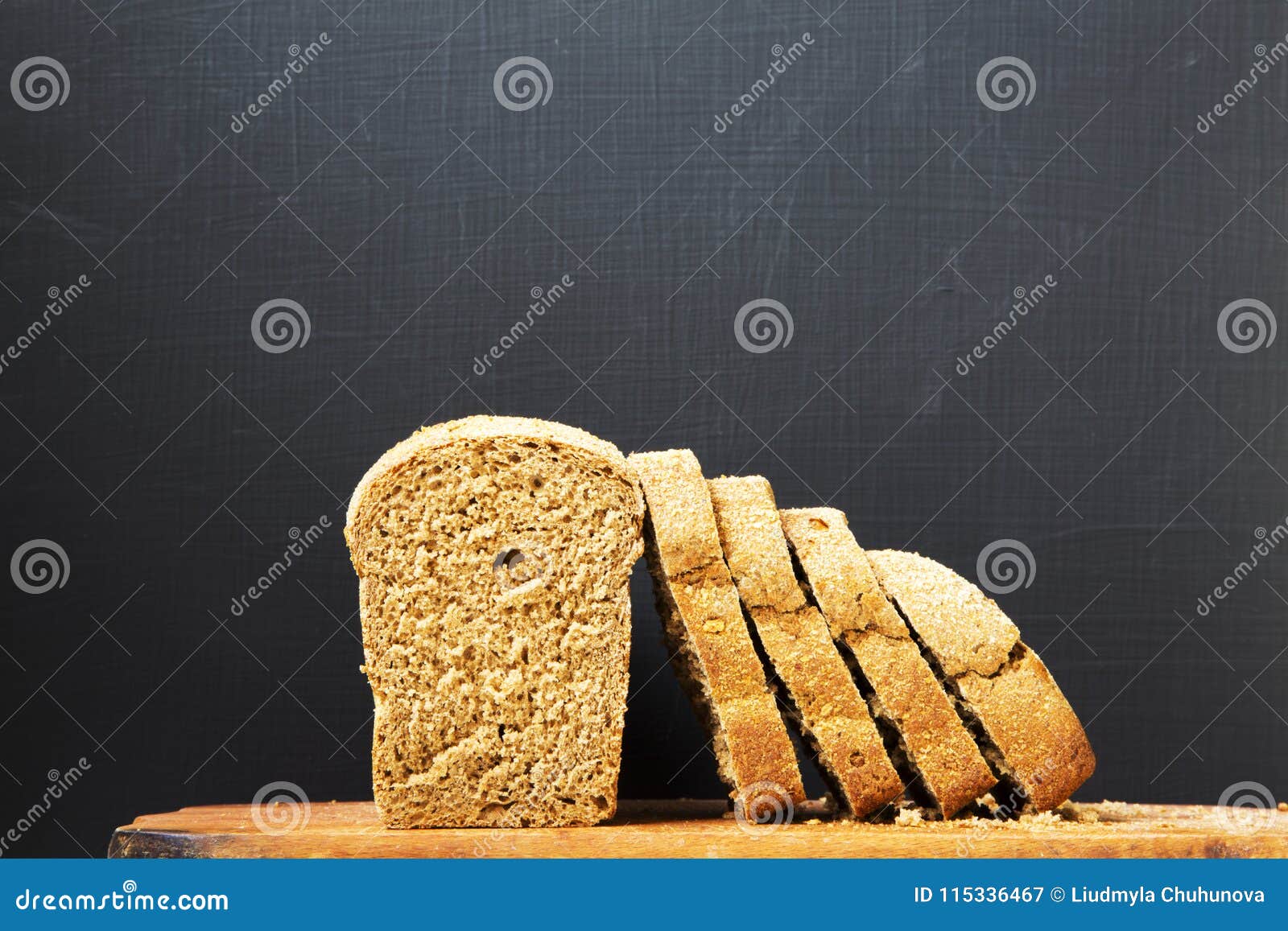 Sliced Bread On Wooden Board Dark Background Side View Copy S Stock Sliced Bread On Wooden Board Dark Background Side View Copy S Stock
