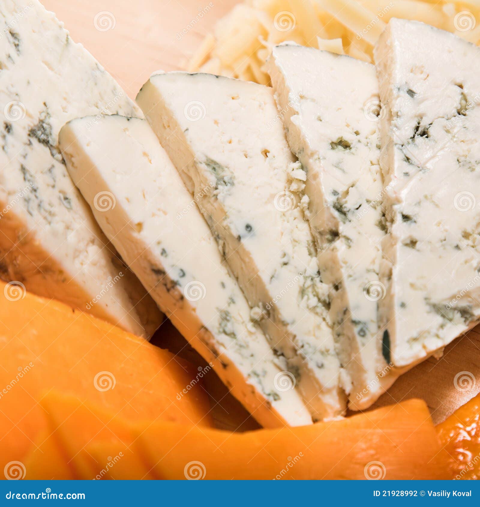 Sliced cheeses and pizza stock photo. Image of crust 21928992