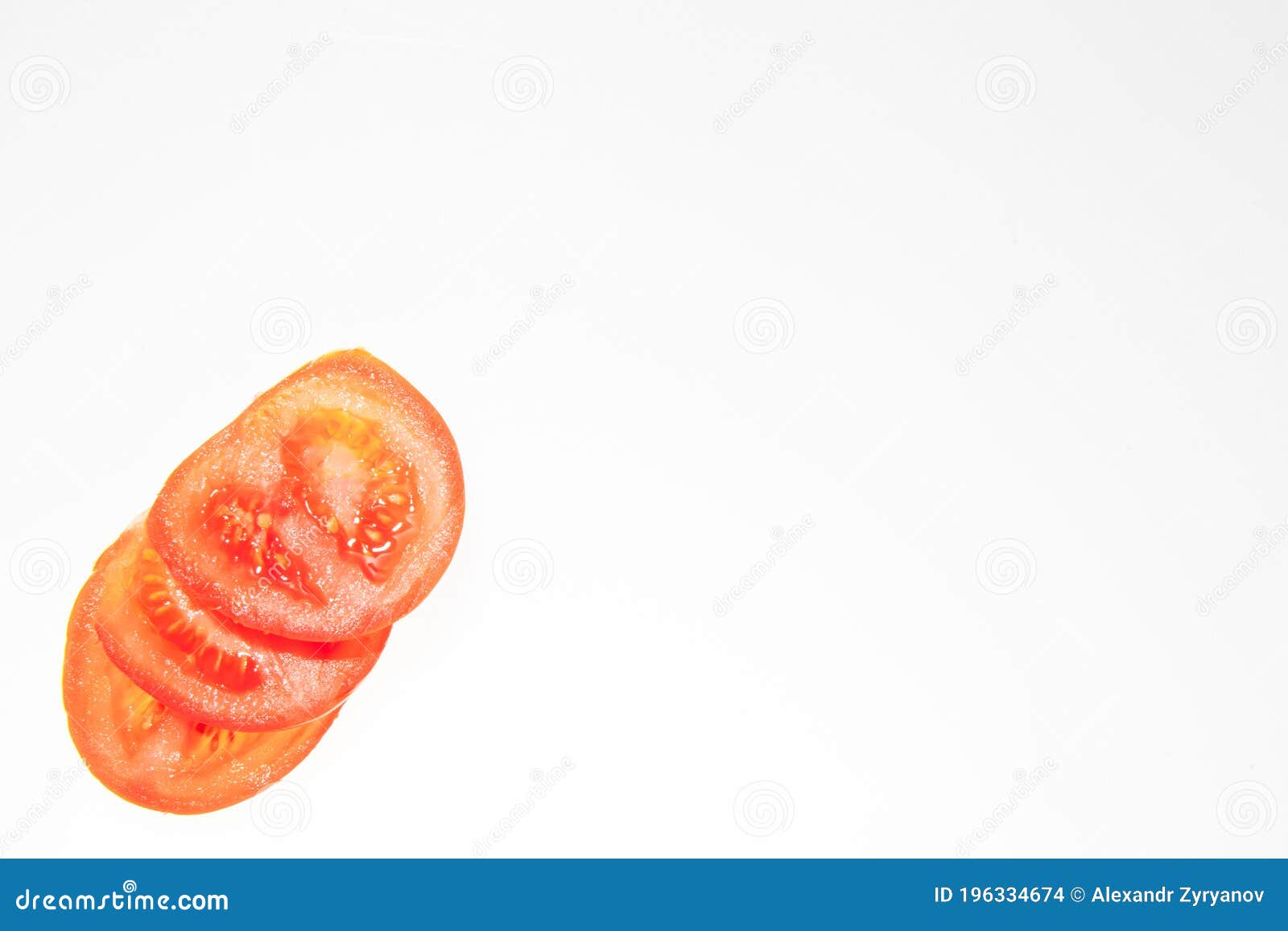 sliced fresh red tomatoes  on the white background