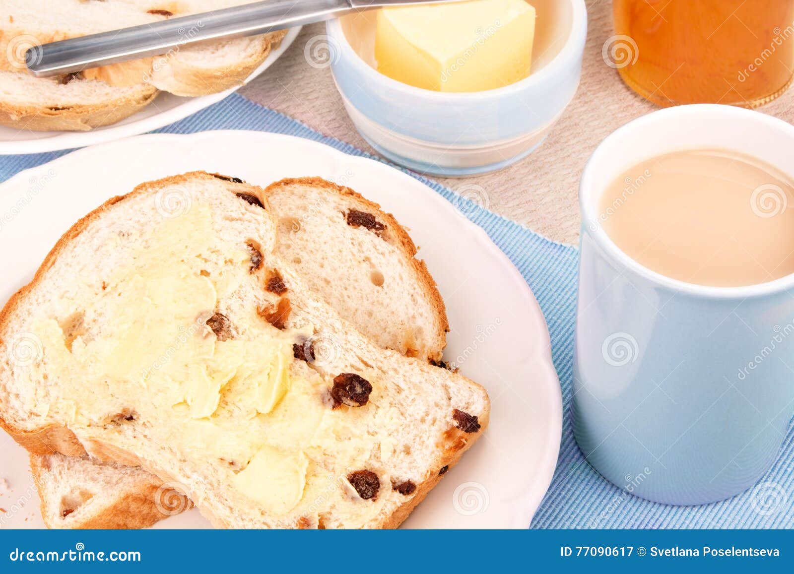 Sliced Fruit Loaf with Sultanas and a Cup of Tea with Milk Stock Image