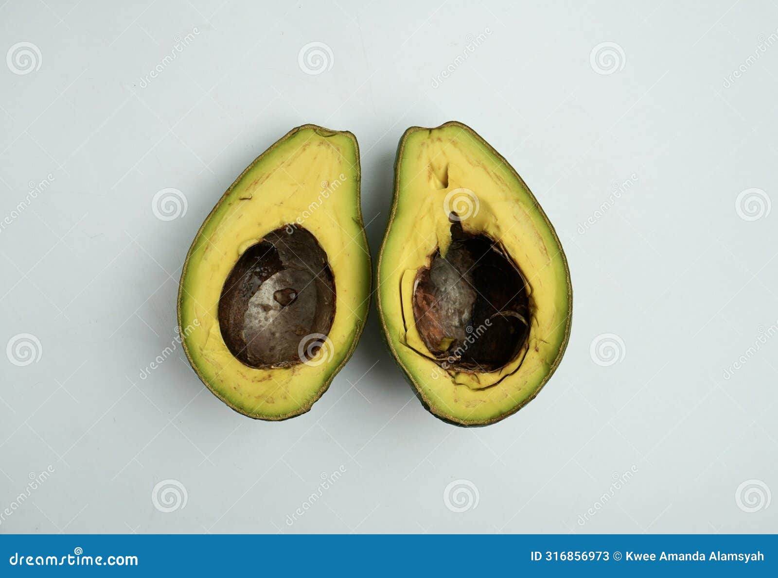 Sliced in Half Unripe Avocado with Knife Marks Stock Image Image of