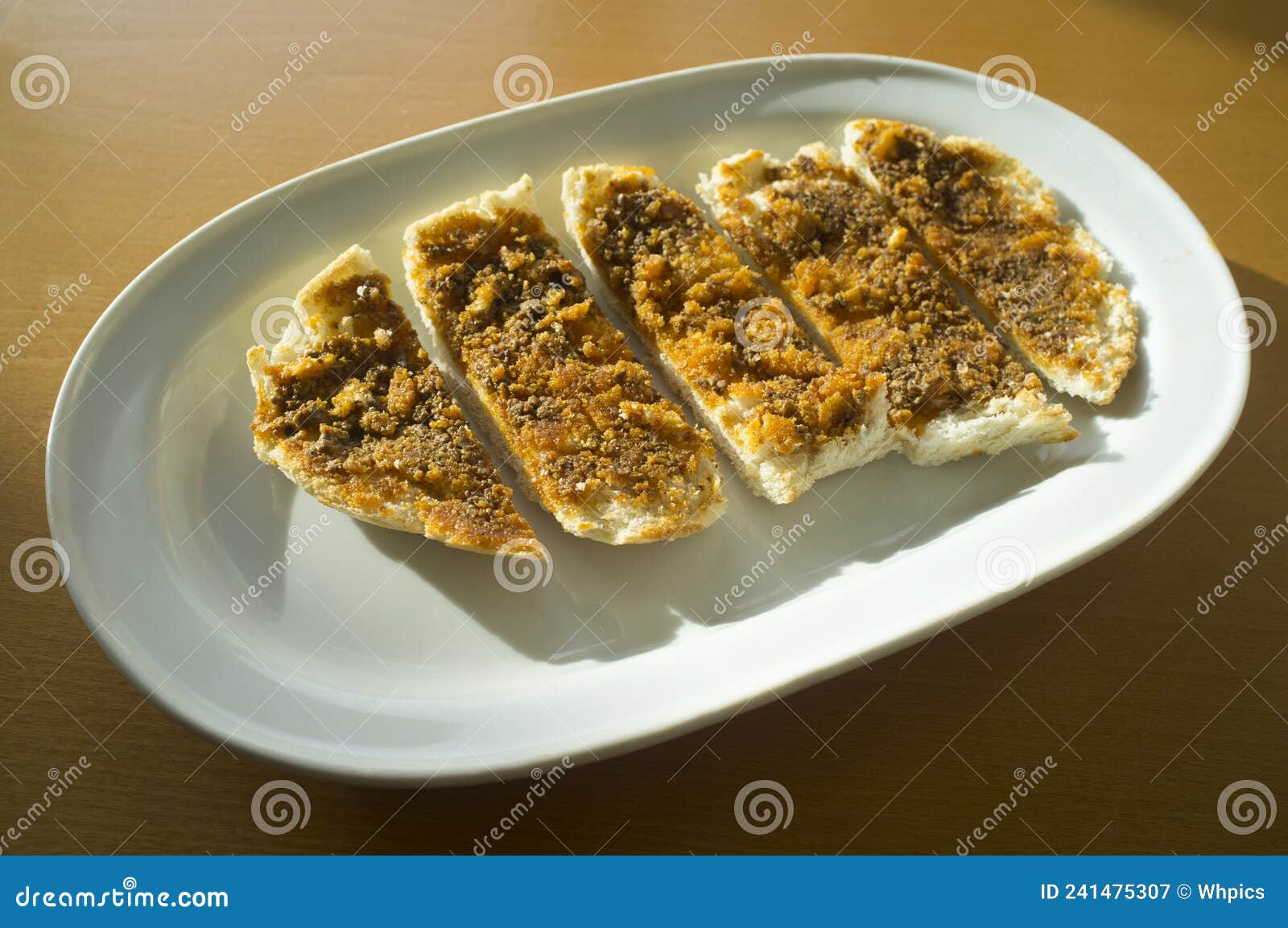 sliced iberian cachuela bread toast
