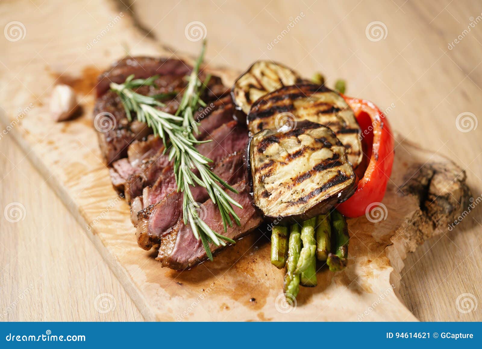 Sliced Medium Rib Eye Steak with Grilled Vegetables Stock Image Image